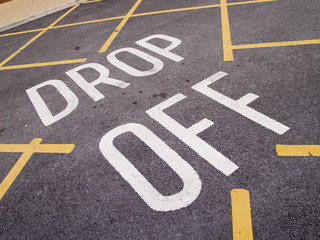 Drop off point at at UK healthcare centre, provided for non-drivng visitors with limited mobility arriving by car, allowing the car to then be driven off to a convenient parking place.