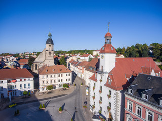 Fototapeta premium aerial view church St. Nicolai and town hall schmoelln thuringia