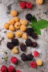 Heap of colorful raspberries 