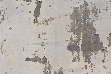 Flaking paint on galvanized metal