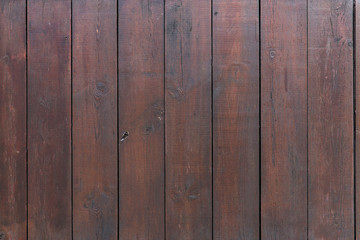 Naklejka premium close up of brown wooden fence boards or wall