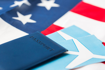 Fototapeta na wymiar american flag, passport and air tickets