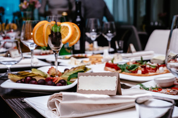 place setting - plate, knife and fork on table