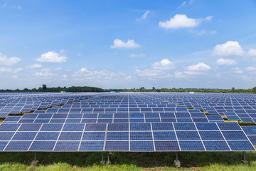 solar photovoltaics  panels in solar power station  on blue sky background