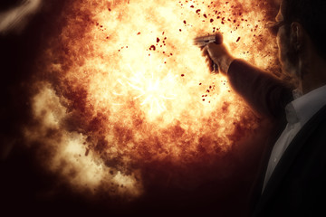 Man with a gun on explosion background