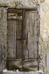 door of wooden plank with bolts of old grunge house