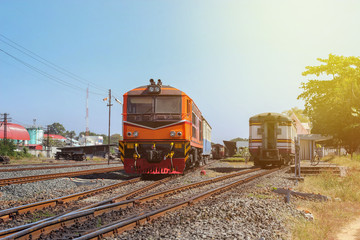 Fototapeta na wymiar orange diesel engine locomotive train