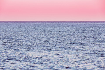 Obraz premium Calm Sea Ocean And Pink Sky Sunset Sunrise Background