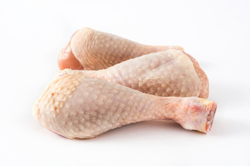 Raw chicken drumsticks isolated on white background

