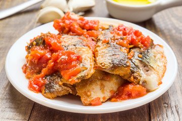 sardine fillets dish with tomato sauce