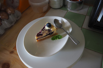 blueberry cheesecake on white dish
