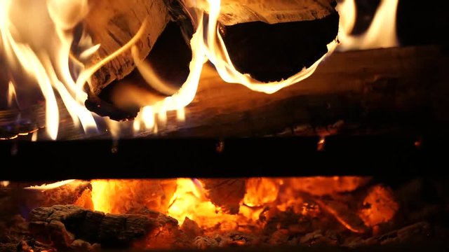 closeup shot footage barbecue grill fire firewood in fireplace with smoldering coal