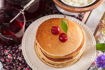 pancakes with cherry flowers still life summer