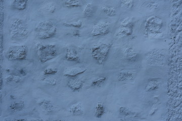 stone wall painted blue