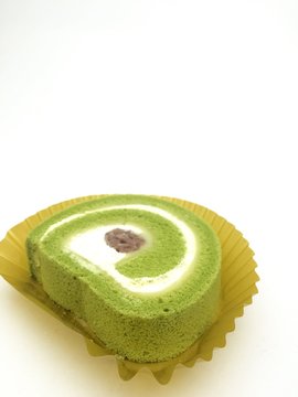 Green Tea Roll Cake With Red Bean Paste and Fresh Cream
