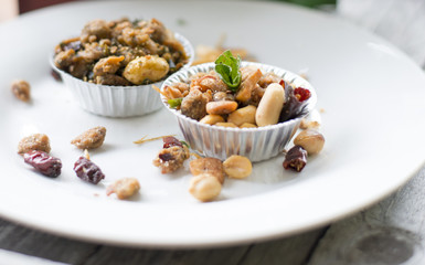 Snacks made from shells. Dried oysters on a white plate