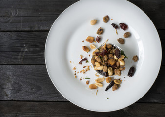 Snacks made from shells. Dried oysters on a white plate