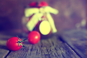 toned photo tomato cherry in a glass jar