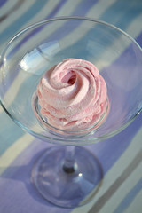 Sweet pink marshmallow - zephyr cake in the glass goblet. Close up of Delicious dessert.
