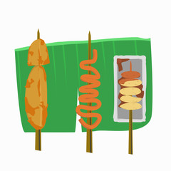 Filipino street foods on banana leaves, intestine, fish balls, banana cue
