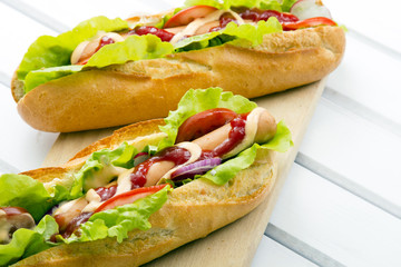 hot dogs on a wooden table