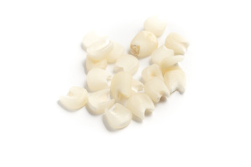 Fototapeta na wymiar White grated corn kernels into a bowl