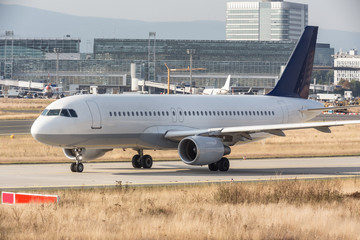 airplane on a starting runway