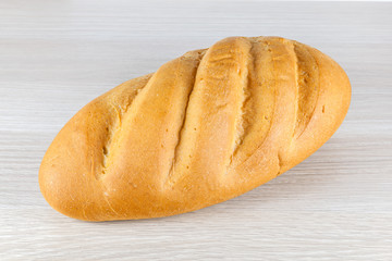 bread loaf on wooden tabled