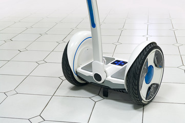 White gyroscooter on the floor.