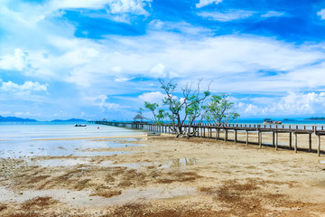 Wooden pier in beautiful beach kho Mak Island, eastern Thailand.