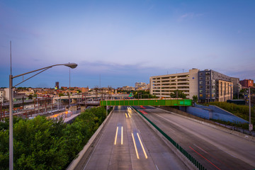 The Jones Falls Expressway at sunset, seen from the Howard Stree