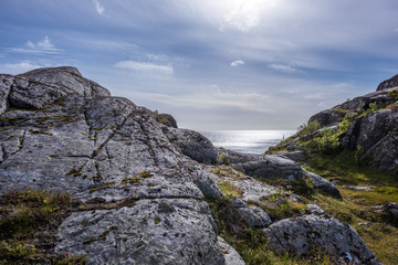Dramatic summer landscape with sharp mountain peaks in Norway.