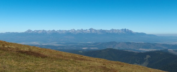Vysoke Tatry mountains range from summit of Kralova hola in Nizke Tatry mountains in Slovakia