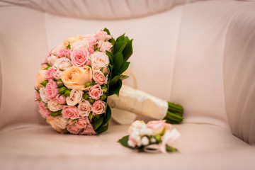Wedding bouquet of pink roses and peonies