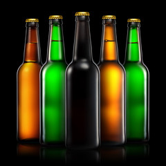Set of beer bottles with clipping path isolated on black background