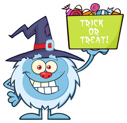 Cute Little Yeti Cartoon Mascot Character With Witch Hat Holding Up A Trick Or Treat Halloween Candy Basket. Illustration Isolated On White Background