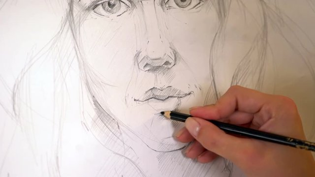 Close up of portrait drawing woman with pencil. Woman hand with pencil drawing woman portrait. 4k.