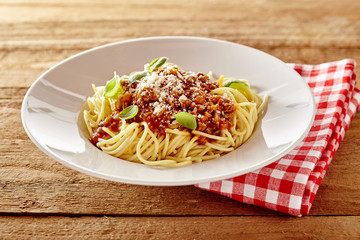 Rustic plate of tasty spaghetti Bolognaise
