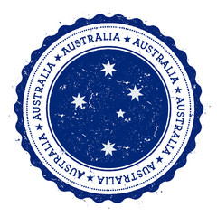 Grunge rubber stamp with Australia flag. Vintage travel stamp with circular text, stars and national flag inside it. Vector illustration.