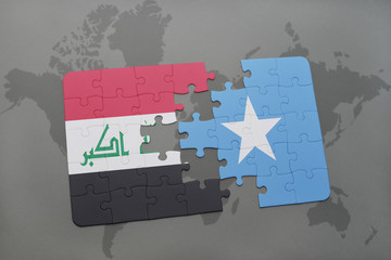 puzzle with the national flag of iraq and somalia on a world map background.