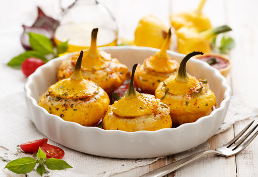 Baked Pattypan squash , stuffed with cheese, vegetarian food