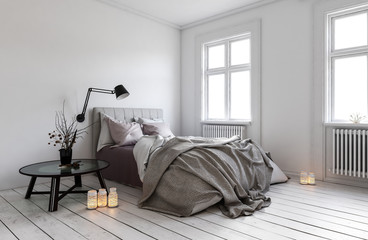 Single bed in room with radiators under windows - obrazy, fototapety, plakaty