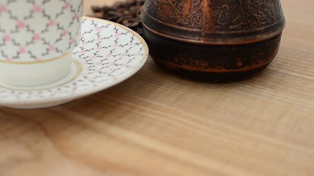 Coffee, coffee cup and grains.