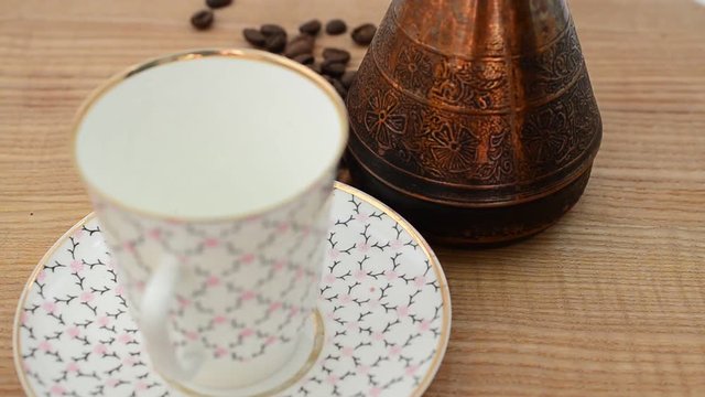 Coffee, coffee cup and grains.