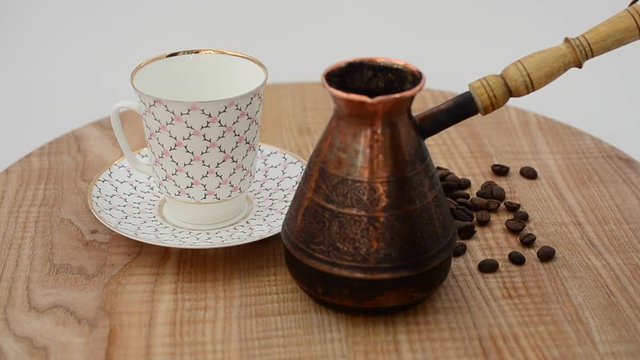 Coffee, coffee cup and grains.