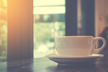 Coffee cup in coffee shop - vintage style