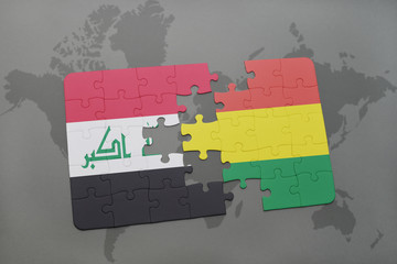 puzzle with the national flag of iraq and bolivia on a world map background.