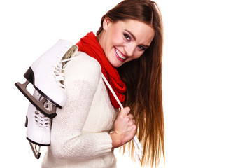 Naklejka premium Smiling woman with ice skates