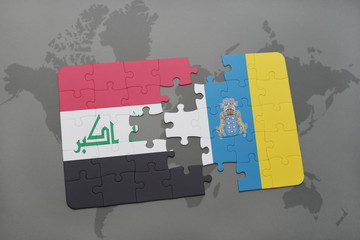 puzzle with the national flag of iraq and canary islands on a world map background.