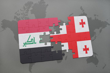 puzzle with the national flag of iraq and georgia on a world map background.